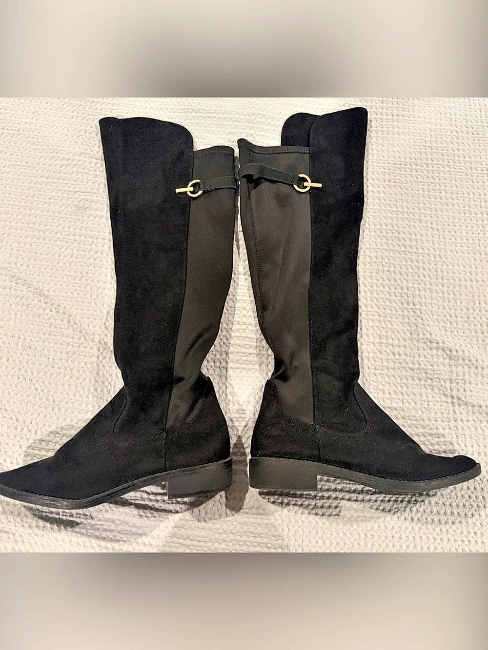 Knee high black riding boots